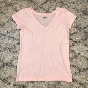 Thin, light pink Athleta shirt